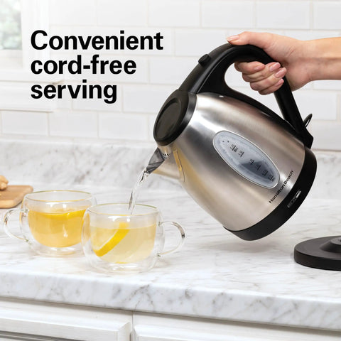 Electric Tea Kettle 1.7 Liter Cordless Boiler With 1500 Watts For Fast Boiling Auto Shutoff And Boil Dry Protection Stainless Steel being used to pour hot water into cups.