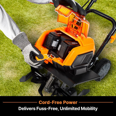 Person inserting batteries into Powerful Workhorse Brushless 48V Cordless Tiller Cultivator With Two 24V Four Point Zero Amp Hour Batteries