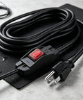 10 Foot Heavy Duty 3 Prong Extension Cord With Built In Toggle Switch And 14 Awg Copper Wire Rated 15 Amps on a textured surface.