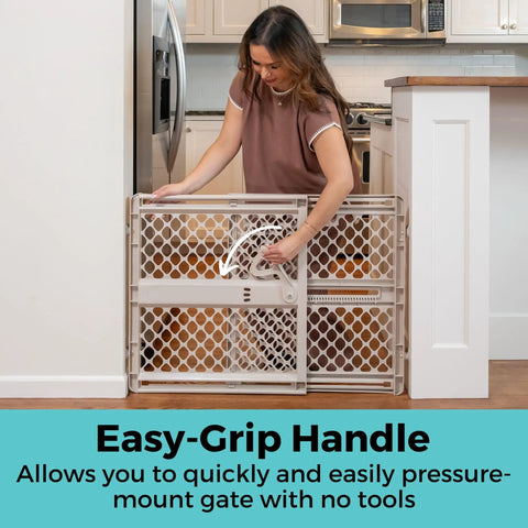 Woman using easy-grip handle on Top Shelf Adjustable Baby Gate For Kids And Toddlers Heavy Duty Plastic Child Safety Barrier.