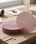 Super Cool 5 inch Mesh Sanding Discs With Hook And Loop Backing, 240 Grit Fine Aluminum Oxide For Wood and Metal Project Dust Free Set of 50 in stack on wooden surface.