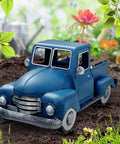 Old School Blue Metal Truck Planter Decor For Farmhouse Tables And Desks in garden setting with flowers