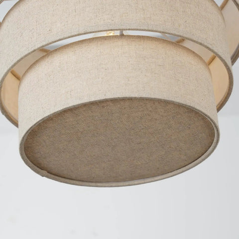Close-up of beige three-tier linen drum shade for E26 ceiling pendant light, visible fabric texture and round shape.