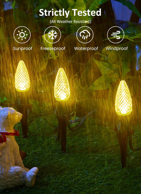 Outdoor Twenty Five Point Seven Feet 20 LED C9 Christmas String Lights With Strawberry Shell Stakes in garden during rain