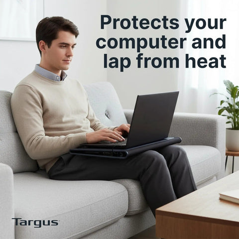 Person using a 17 Inch Dual Fan Laptop Chill Mat With Soft Neoprene Surface on sofa, designed for cooling and comfort with USB A power.