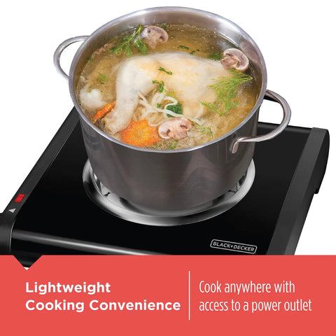 Single Burner Portable Buffet Range With Adjustable Temperature, Coiled Element Keeps Food Hot under a pot of soup on the burner