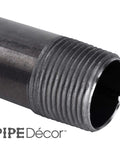 Close-up of one inch by three inch black steel plumbing pipe six pack with pre cut connectors for DIY furniture and decor projects.