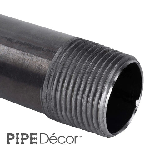 Close-up of one inch by three inch black steel plumbing pipe six pack with pre cut connectors for DIY furniture and decor projects.