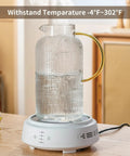 Two Piece Glass Pitcher Set Including Secure Glass Lid And Cushioned Anti Slip Silicone Base For Kitchen Counter Safe Serving Heavy Duty Water Jug Hassle Free Dispensing For Iced Coffee And Fresh Juice with temperature warning.