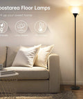 Tall Black LED Floor Lamp With Integrated LED Beads 70.1 Inches Torchiere beside sofa in living room setting
