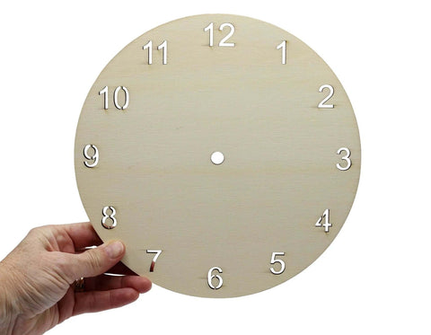 Front view: Creative Hobbies 9-inch round unfinished wood clock face with laser-cut white numerals