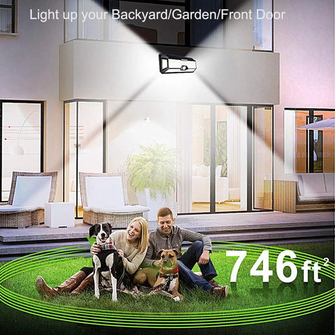 Family in backyard illuminated by Crazy Bright Solar Outdoor Flood Lights With 268 LEDs, 4000 Lumens, IP65 waterproof