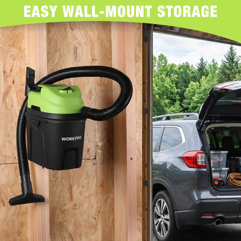 Heavy Duty 1.5 Gallon Wet And Dry Shop Vacuum Cleaner With 2.5 Peak Hp Motor mounted on wall for compact garage and car cleanup.