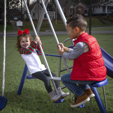 Kids playing on Backyard Play Set With 6 Foot Wave Slide, 6 Stations, And Room For Up To 8 Kids, featuring galvanized steel swings