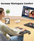 17 Inch Black Corner Desk Extender For L Shaped Workstations visible on a wooden desk with a monitor and keyboard setup.
