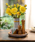 Solid Wood Lazy Susan Set Big Round Serving Tray With Hella Smooth Ball Bearing Turntable Base For Kitchen Counter And Dinner Party Centerpiece Slick Spinning Organizer Easy Setup Stand with flowers and condiments.