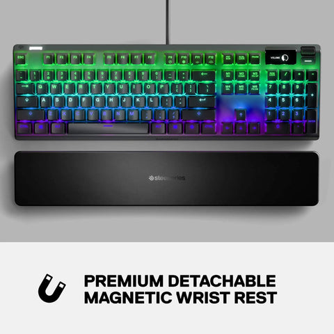 Top Tier Mechanical Gaming Keyboard Featuring Integrated OLED Display USB Passthrough Media Controls Heavy Duty Aluminum Housing Tactile Clicky Blue Switches Full Spectrum RGB Lighting For Gamers Ready To Level Up Their Daily Rig with RGB lighting and wrist rest.
