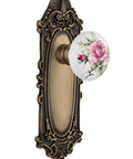 Retro Victorian Plate With White Rose Porcelain Knob Passage Door Hardware In Antique Brass For Vintage Or Modern Doors Double Dummy Set Fits Standard Door Thickness From One And Three Eighths To One And Three Quarters Inches.