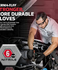 Person wearing Heavy Duty Six Mil Nitrile Disposable Gloves XL Size, working on a car engine with tools.