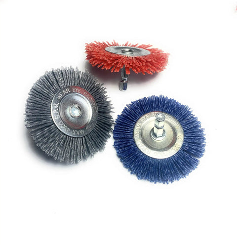 Three colored nylon filament abrasive brushes with 1/4 inch shank for DIY surface prep and rust paint cleanup on various materials.