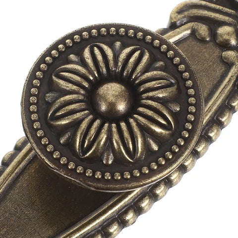 Close-up of Vintage Style Cabinet Handle with Antique Gold Finish from 6 Pack Zinc Alloy Drawer Pulls for Kitchen Wardrobe Dresser Doors