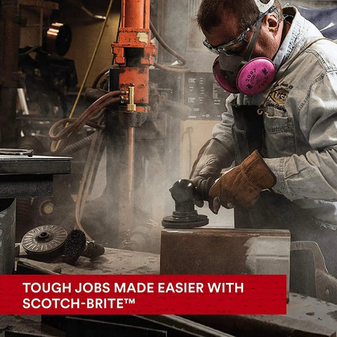 Worker using SiC Extra Coarse Pro Disc For Metal Quick Rust Paint And Coating Removal With Reengineered Fiber in workshop