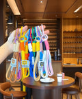 48 Pack Colorful Metal Carabiner Clips For Key Rings And DIY Crafts, Round Snap Hook Keychain Clips held in hand