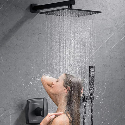 Woman enjoying the Matte Black Shower System With Rain Shower And Handheld, 10 Inch Square Brass Rain Head in operation.