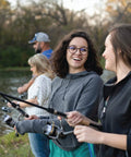Group fishing with Spyn Spinning Fishing Reel Size 20 With Aluminum Spool And Titanium Nitride Bail Wire at a lake
