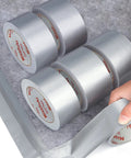 Heavy Duty Waterproof Duct Tape 2 Inch By 30 Yards Six Roll Multipack For Indoor Outdoor Use With Strong Adhesion Tear By Hand No Residue All Weather Repair Tape shown with hand tearing tape