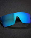 Gender Neutral Polarized Sunglasses With Blue Mirror Lenses Matte Black Frame Z87 Impact Proof UV400 Eye Protection Snap On Side Shields shown close up on black background.