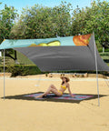 9x10ft Beach Tent Sun Shelter with Pickle Pizza design, UPF 50+, canopy with two poles, setup on sand, woman relaxing underneath.