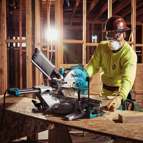 Beefy 10 Inch Slide Compound Miter Saw With 4500 RPM Direct Drive Motor in use at construction site, demonstrating precise cuts