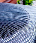 Close-up of AC Defender Full Mesh Outdoor Air Conditioner Cover For All Season Protection on a 37x37x40 inch unit.