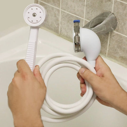 Person installing VersaSpray Portable Handheld Shower Sprayer For Bathtubs Without Diverter Fits Round Or Square Tub Spouts White 1 Pack
