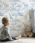 Super Easy Peel And Stick Wallpaper Roll Featuring Rad Safari Animal Prints In Classic Blue And White Hues For A Fresh Jungle Room Backdrop.