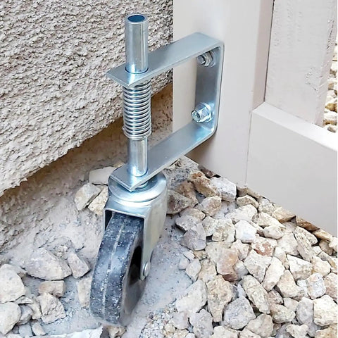 Beefed Up 4 Inch Gate Caster Wheel Set With Spring Loaded Swivel installed on wooden gate for mobility on rough ground