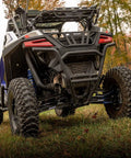 Arched Boxed Radius Rods for Polaris RZR Pro XP and Pro XP 4 Off Road Upgrade With High Ground Clearance Beefy Rugged Steel Build Powder Coated Black Finish Easy Install And Durable Performance, rear view on RZR
