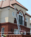 Heavy-Duty Ladder Stabilizer With Wing Span Wall Standoff For Extension Ladders, Gutter Access And Roof Work in use on a house.