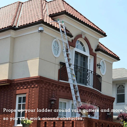 Heavy-Duty Ladder Stabilizer With Wing Span Wall Standoff For Extension Ladders, Gutter Access And Roof Work in use on a house.