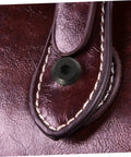 Black countersunk cap nut on leather with stitching, part of Premium Binding Screws And Countersunk Cap Nuts Designed For Hassle Free Install On Scrapbooks Photo Albums Files Craft Journals Hella Sturdy Fasteners Smooth Setup Top Tier Hardware.