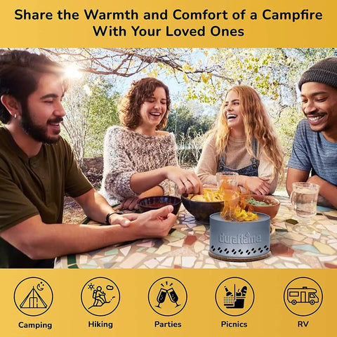 Group enjoying Tabletop Bonfire Fire Pit For Indoor Or Outdoor Use Ultra Lightweight And Compact with food, outdoors on a picnic table.