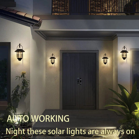 2 Pack Solar Lanterns Outdoor Hanging Lights For Porch Fence Yard Glass Metal Waterproof Dusk To Dawn Auto On Warm White LED Garden Lanterns With Wall Mount Bracket illuminating a porch.