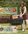Person using 43-Gallon Dual Chamber Compost Tumbler With 360 Degree Rotating Design, Steel Frame, Aeration System, And Dual Sliding Doors.