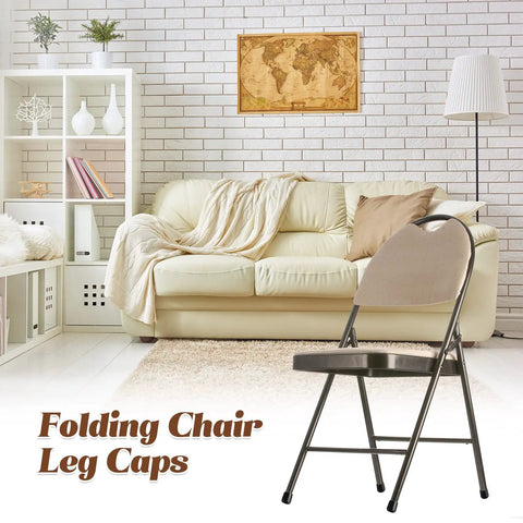 Seven Eighths Inch Folding Chair Leg Caps Set shown on a black folding chair in a living room setting with white sofa.