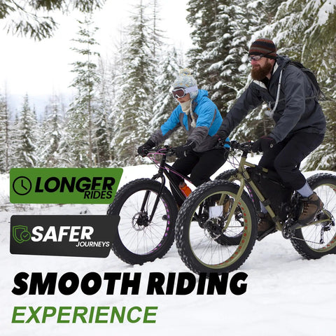 Two cyclists riding fat bikes with Fat Bike Tube 20X4.0 With Schrader Valve Butyl Rubber Inner Tube through snowy forest