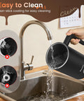 4-In-1 Electric Milk Frother And Steamer For Home Barista Vibes With Easy To Clean Feature Shown Being Rinsed Under Faucet