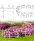 Decorative Garden Fence Border Panel Set 10 Pack With Easy Install No Dig Movable Metal Edging For Flower Beds And Lawns 13 Inch High By 17 Inch Wide 14 Ft Of Outdoor Weather Resistant Yard Borders showcasing white panels in a garden.