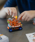 Rugged Metal Erector Set Build Kit For Adults And Teens, 389-Piece STEM Toy To Build A Robot Or Excavator, Dope Educational Engineering Craft For Advanced Kids And Hobbyists; hands assembling robot