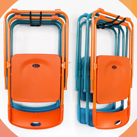 Orange and blue folding chairs stacked against a peach and yellow background